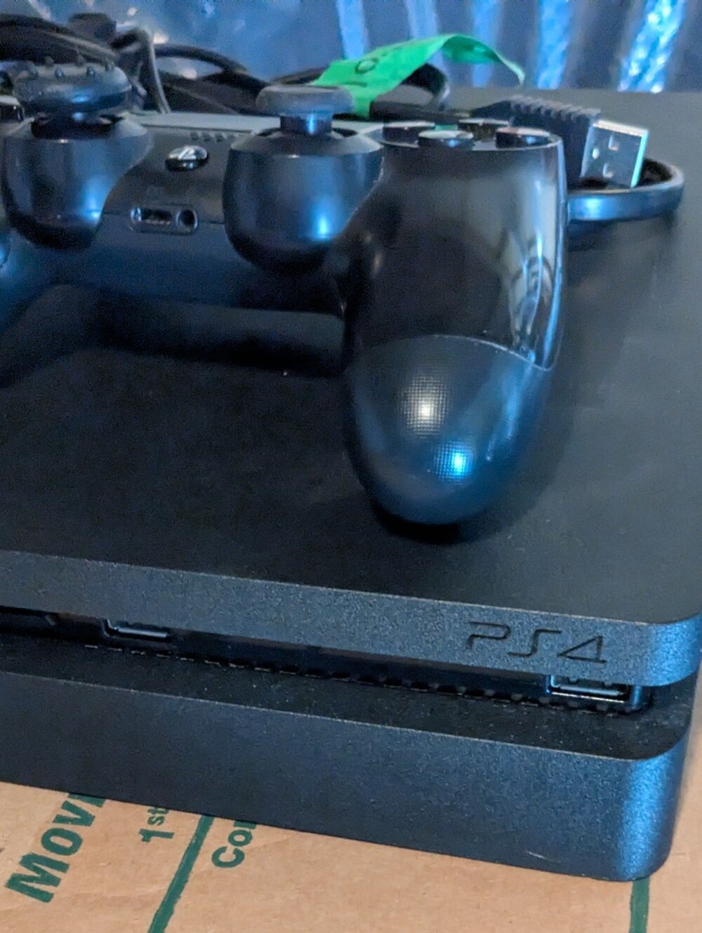 Sony PS4 1tb Slim Console with Black DualShock Controller And Cables